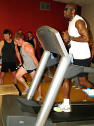 Kirk Gibbons on the treadmill - Les Barrow on the Step Ups