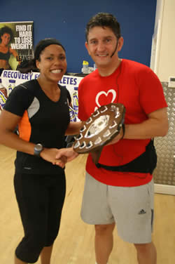 Penny recieves the annual shield for The UK's Ultimate Female  Gym Athlete